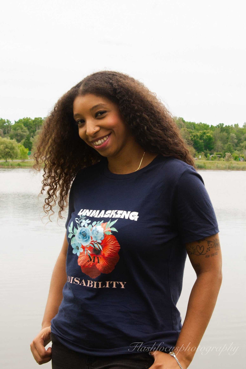 Light blue Face Off T-Shirt with floral design symbolizing authenticity and style